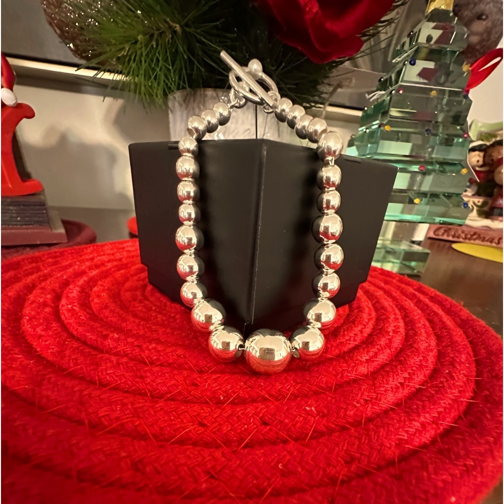 Tif Ball bracelet. 7inches .